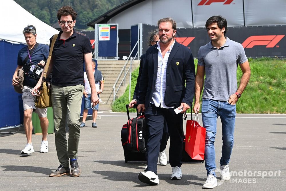 Mattia Binotto, Team Principal, Ferrari, arrives at the track with Carlos Sainz, Ferrari F1-75