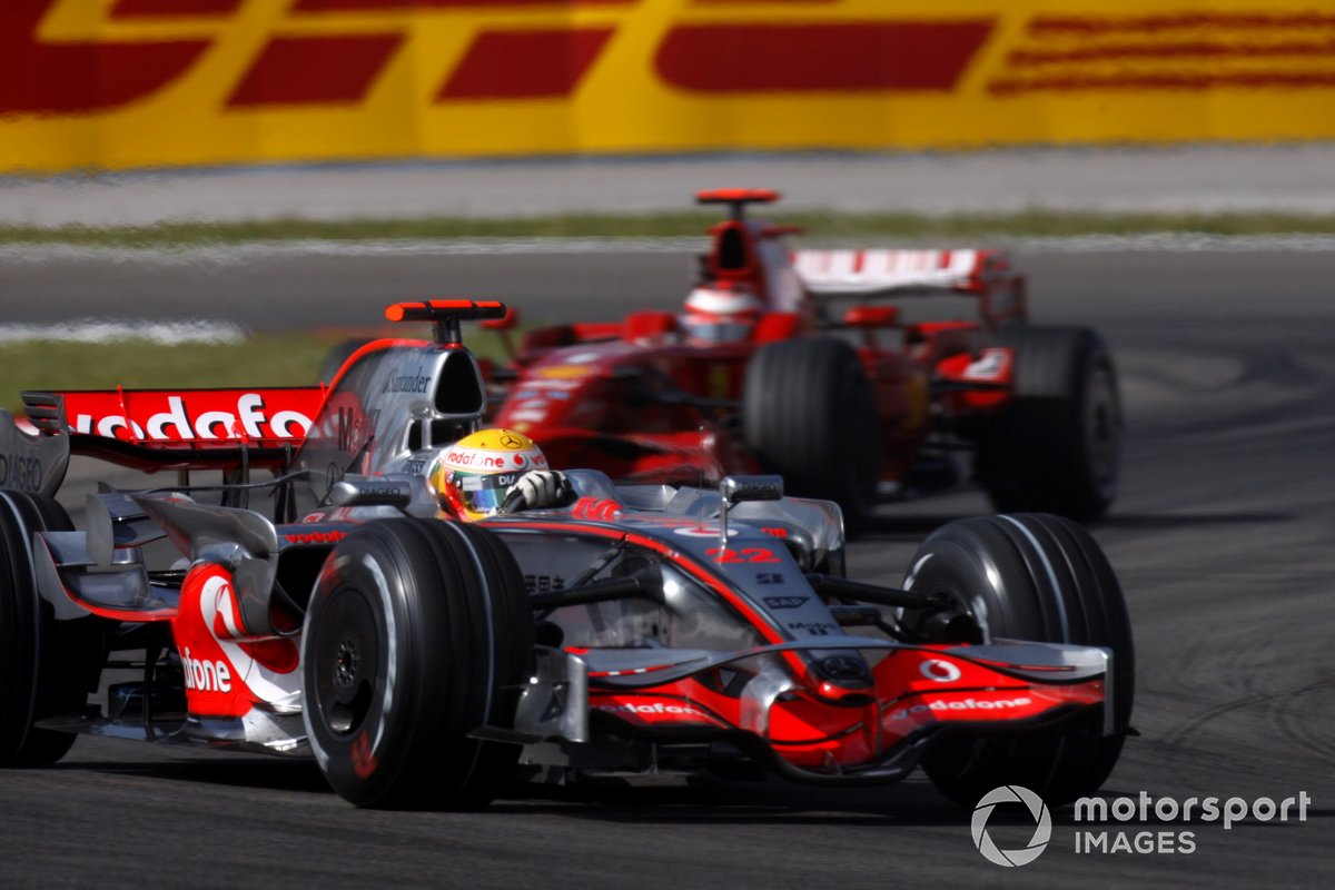 Lewis Hamilton, McLaren MP4-23 Mercedes, leads Kimi Raikkonen, Ferrari F2008