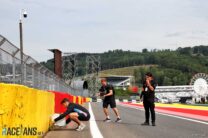 Victor Martins lays flowers at the site of Anthoine Hubert's fatal crash, Spa-Francorchamps, 2024