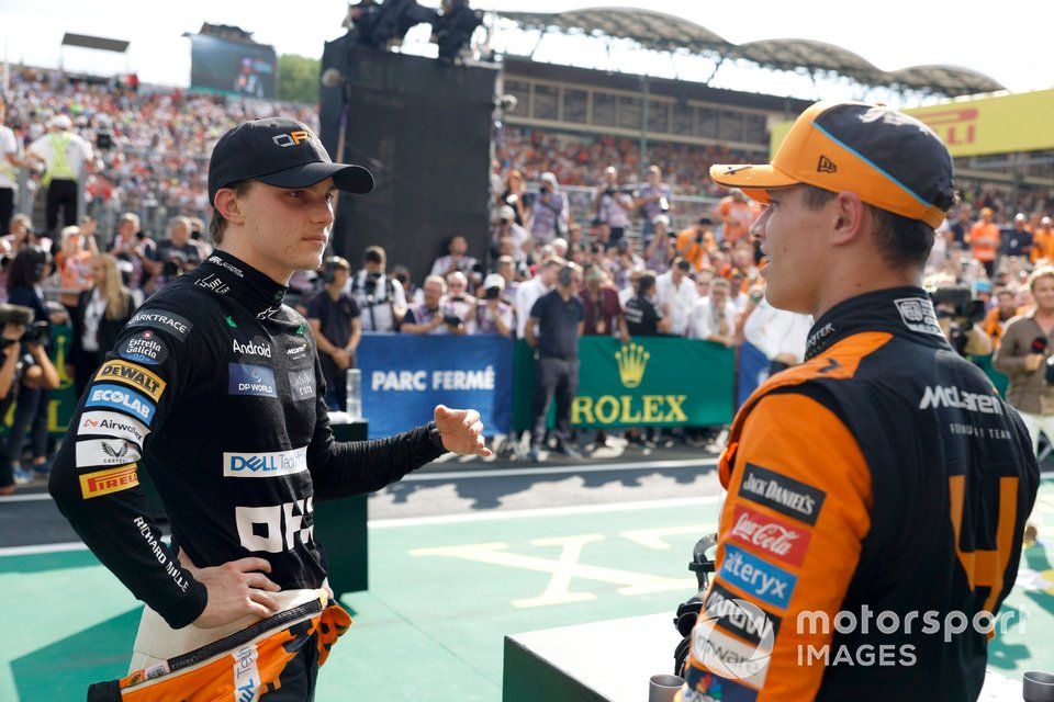 Oscar Piastri, McLaren F1 Team, 1st position, Lando Norris, McLaren F1 Team, 2nd position, talk in Parc Ferme