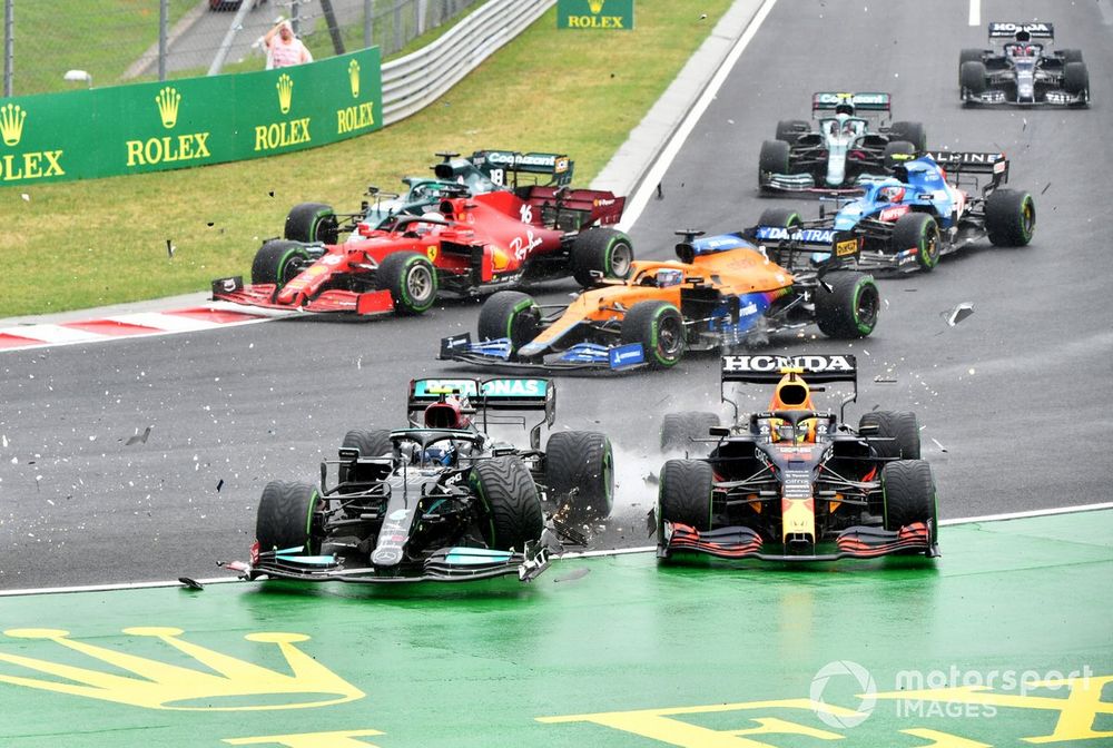 Valtteri Bottas, Mercedes W12, collides with Sergio Perez, Red Bull Racing RB16B, at the start