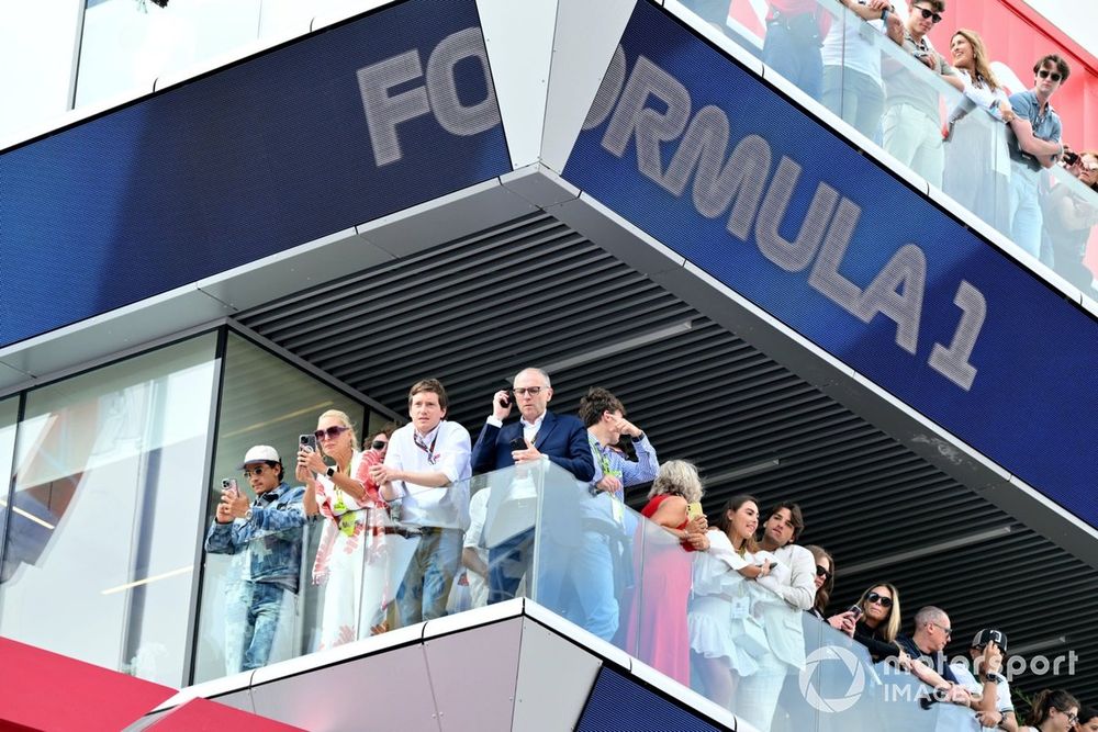 Stefano Domenicali, CEO, Formula One Group, watches the podium ceremony