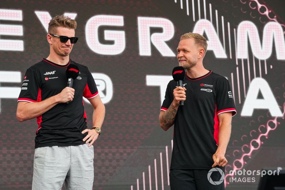 Kevin Magnussen, Haas F1 Team, Nico Hulkenberg, Haas F1 Team, on stage at a fan event