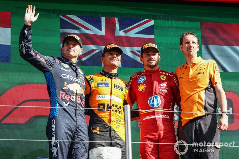 Max Verstappen, Red Bull Racing, 2nd position, Lando Norris, McLaren F1 Team, 1st position, Charles Leclerc, Scuderia Ferrari, 3rd position, the McLaren trophy delegate on the podium