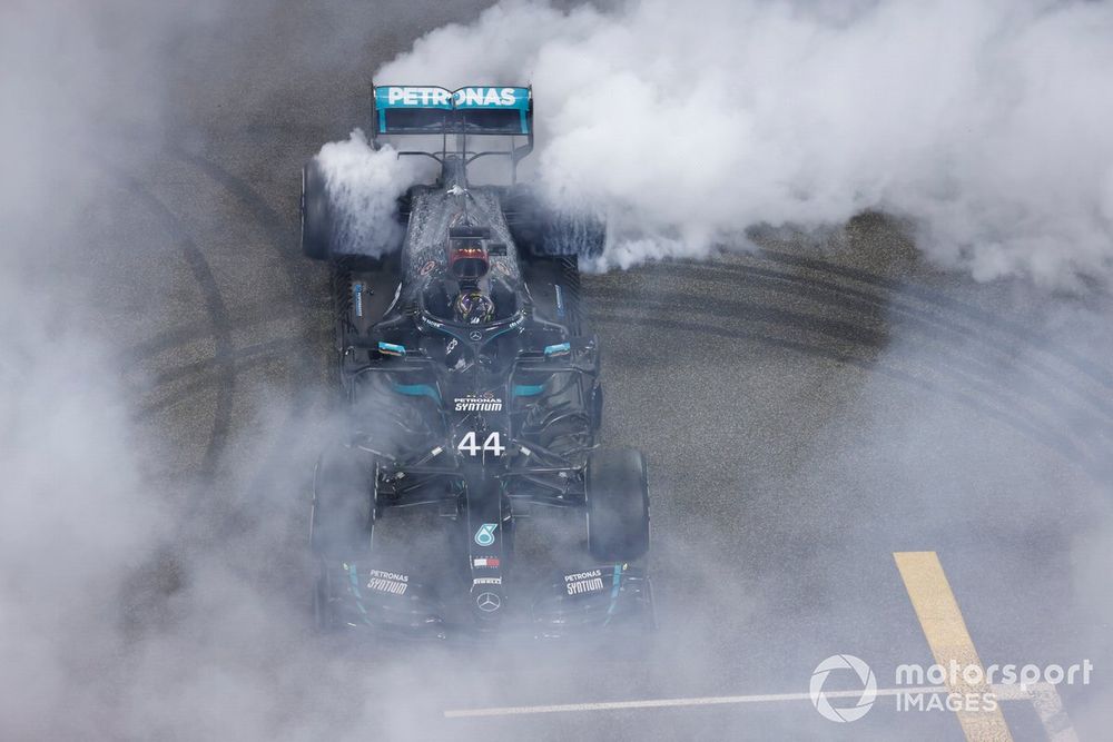 Lewis Hamilton, Mercedes-AMG F1, 3rd position, performs celebratory donuts after the race