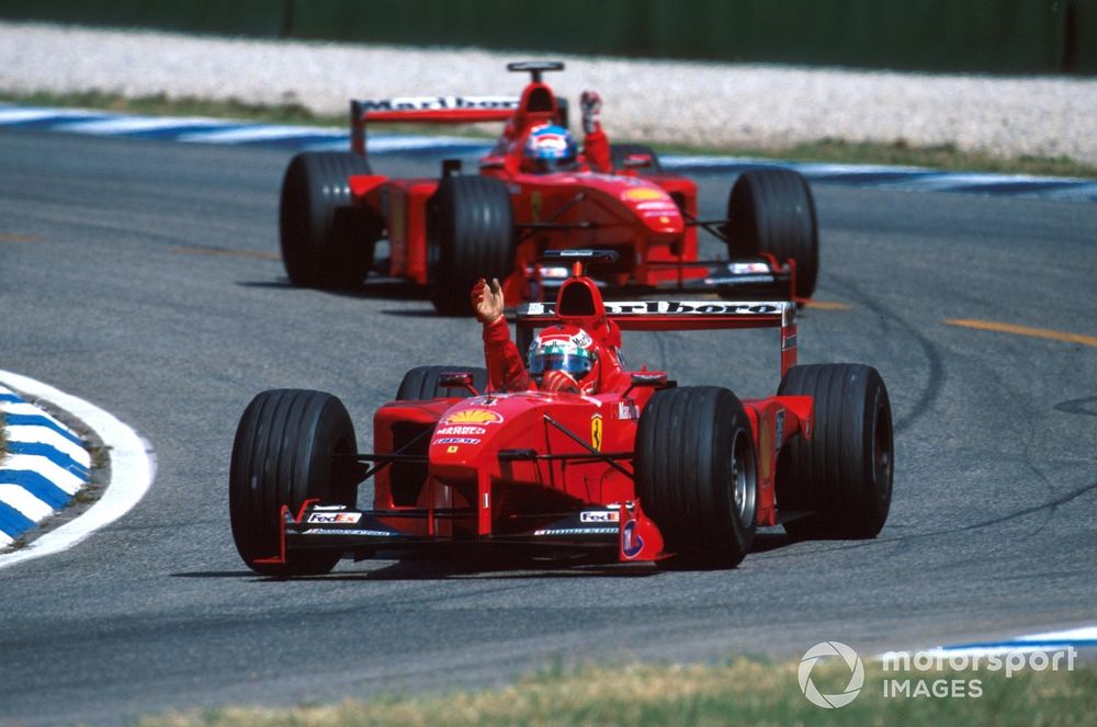 Schumacher's broken leg handed Irvine a chance to claim the world title. He was supported by Salo to win in Germany, but fell short to McLaren and Hakkinen