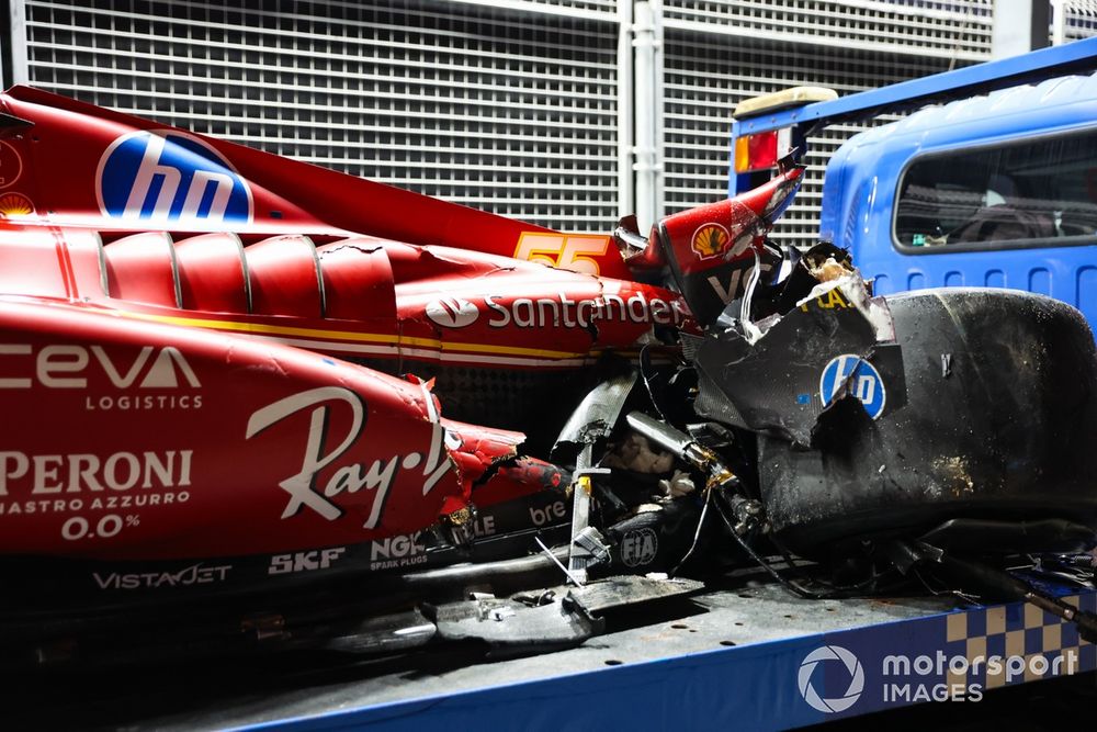 The damaged car of Carlos Sainz, Ferrari SF-24, on a truck