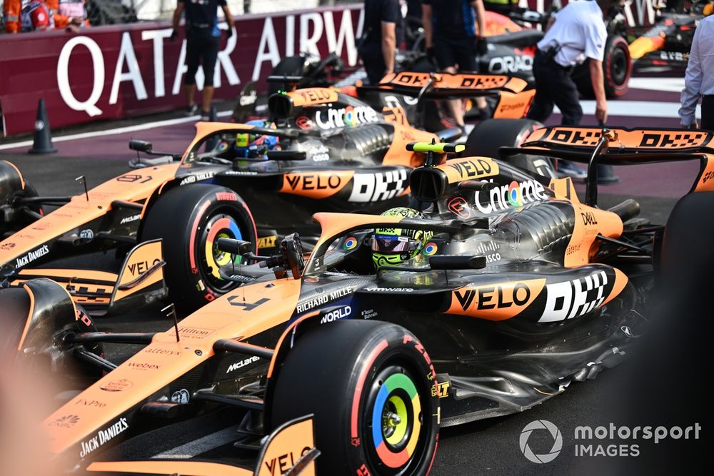 Pole man Lando Norris, McLaren MCL38, Oscar Piastri, McLaren MCL38, arrive in Parc Ferme after Qualifying