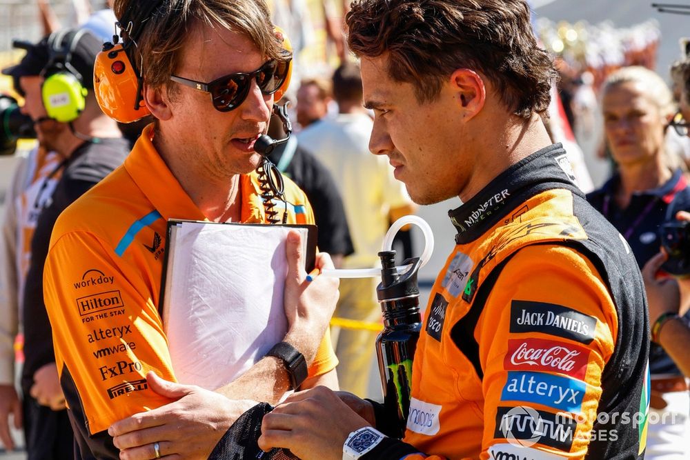 Lando Norris, McLaren F1 Team, on the grid with his engineer