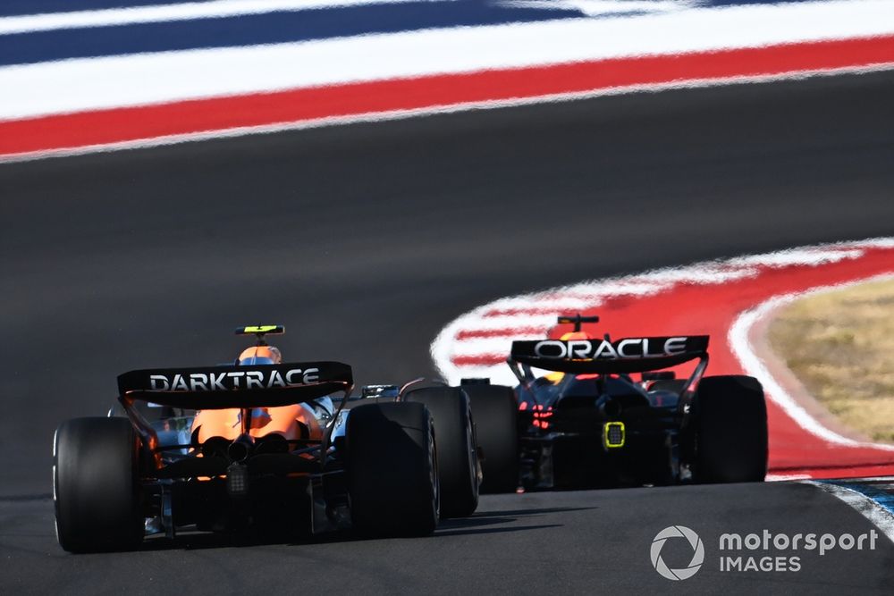 Max Verstappen, Red Bull Racing RB20, battles with Lando Norris, McLaren MCL38