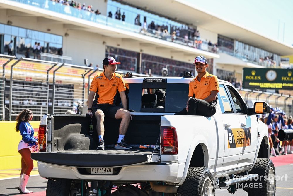 Oscar Piastri, McLaren F1 Team, Lando Norris, McLaren F1 Team, wave to the crowd on the drivers' parade