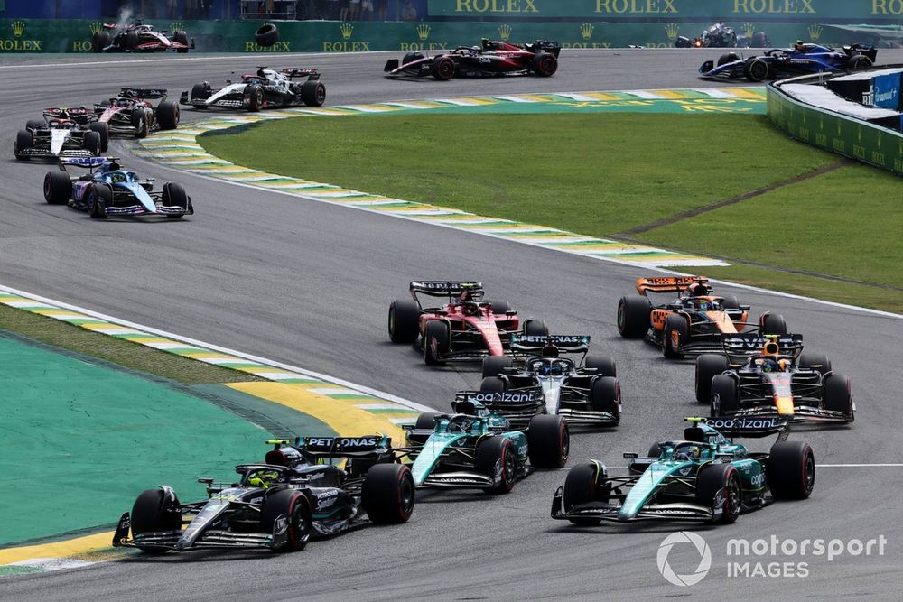 Lewis Hamilton, Mercedes F1 W14, Fernando Alonso, Aston Martin AMR23, Lance Stroll, Aston Martin AMR23, the rest of the field, as Kevin Magnussen, Haas VF-23, Alex Albon, Williams FW45, crash