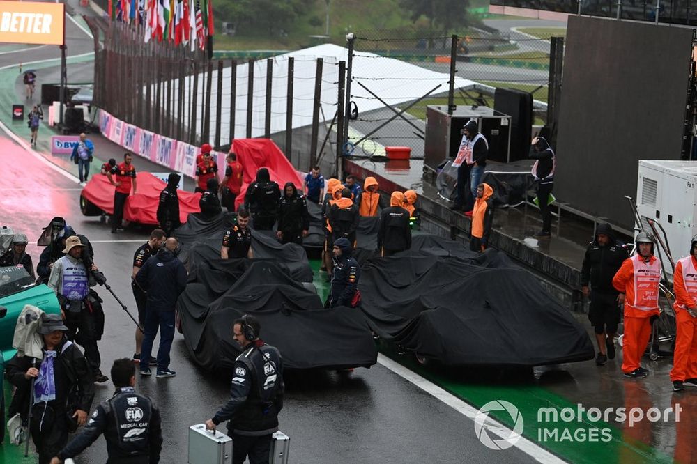 Cars under covers in Parc Ferme