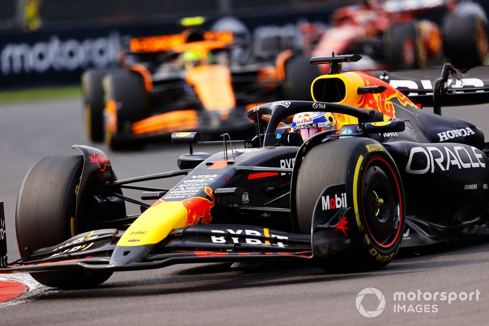 Max Verstappen, Red Bull Racing RB20, leads Lando Norris, McLaren MCL38