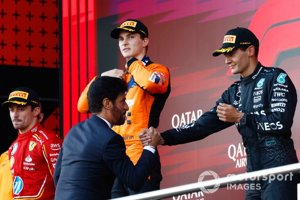 Mohammed Ben Sulayem, President, FIA, congratulates George Russell, Mercedes-AMG F1 Team, 3rd position, on the podium