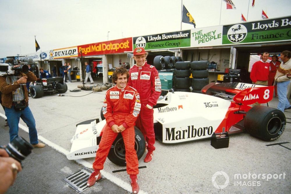 McLaren team-mates Alain Prost and Niki Lauda, pose for a team shot