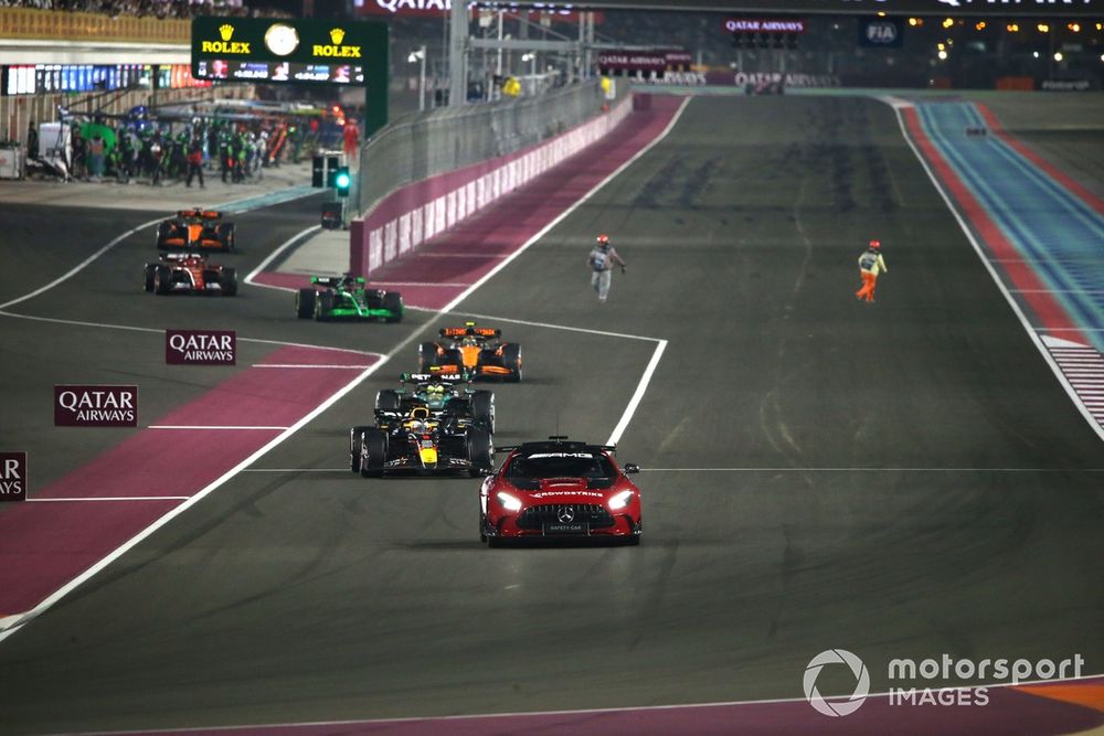 The Mercedes AMG Safety Car Max Verstappen, Red Bull Racing RB20, Lewis Hamilton, Mercedes F1 W15, Lando Norris, McLaren MCL38 out of the pit lane 