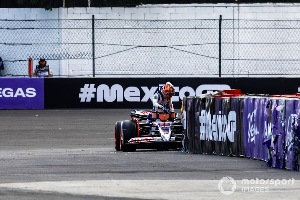 Yuki Tsunoda, RB F1 Team VCARB 01, climbs out of his car after a crash at the end of Q2