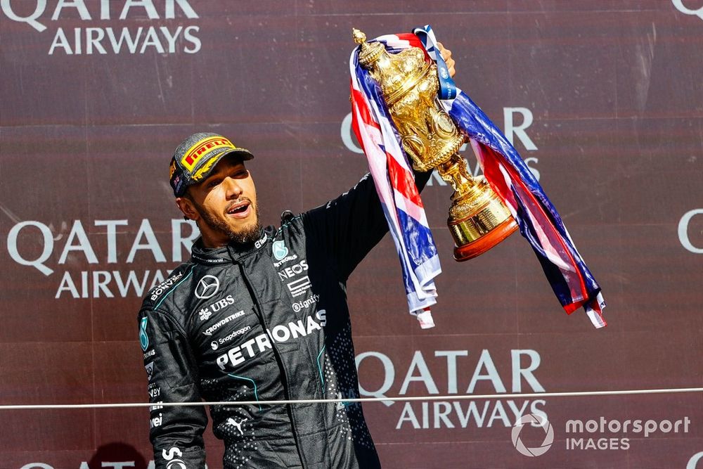 Lewis Hamilton, Mercedes-AMG F1 Team, 1st position, celebrates on the podium with the winners trophy