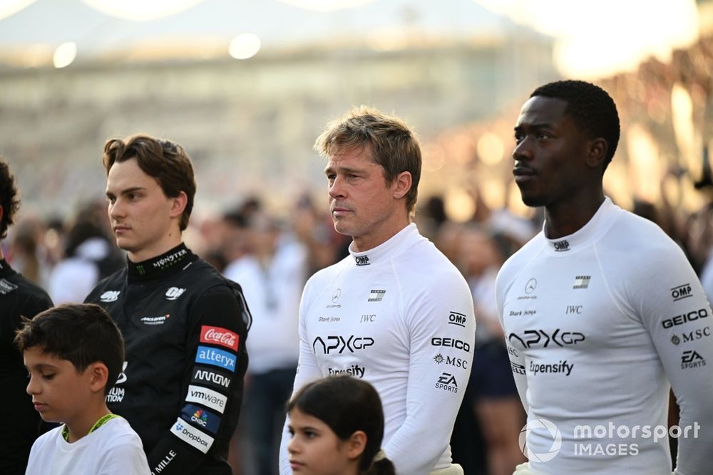 Brad Pitt and Damson Idris film a scene on the starting grid alongside McLaren's Oscar Piastri