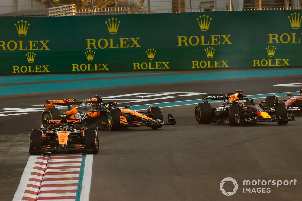 Oscar Piastri, McLaren MCL38 and Max Verstappen, Red Bull Racing RB20 collide on the corner causing each other to spin